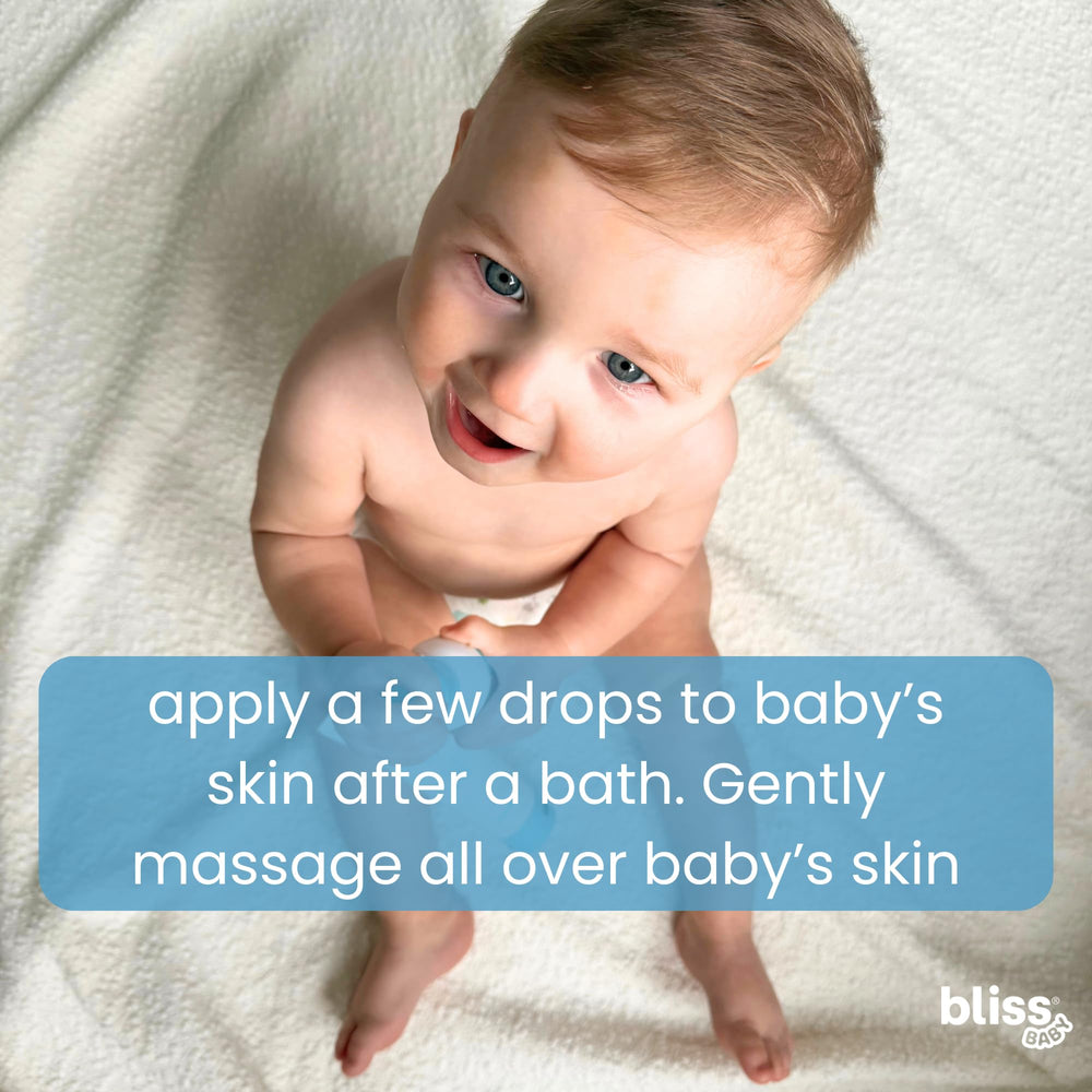 Bliss Baby Oil travel-size bottle ready for on-the-go care.