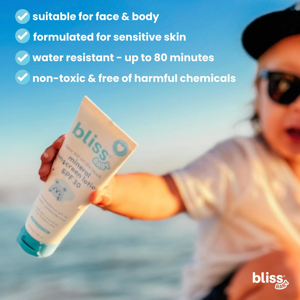 Bliss Baby Sunscreen during swimming demonstrates water-resistant protection for active kids.