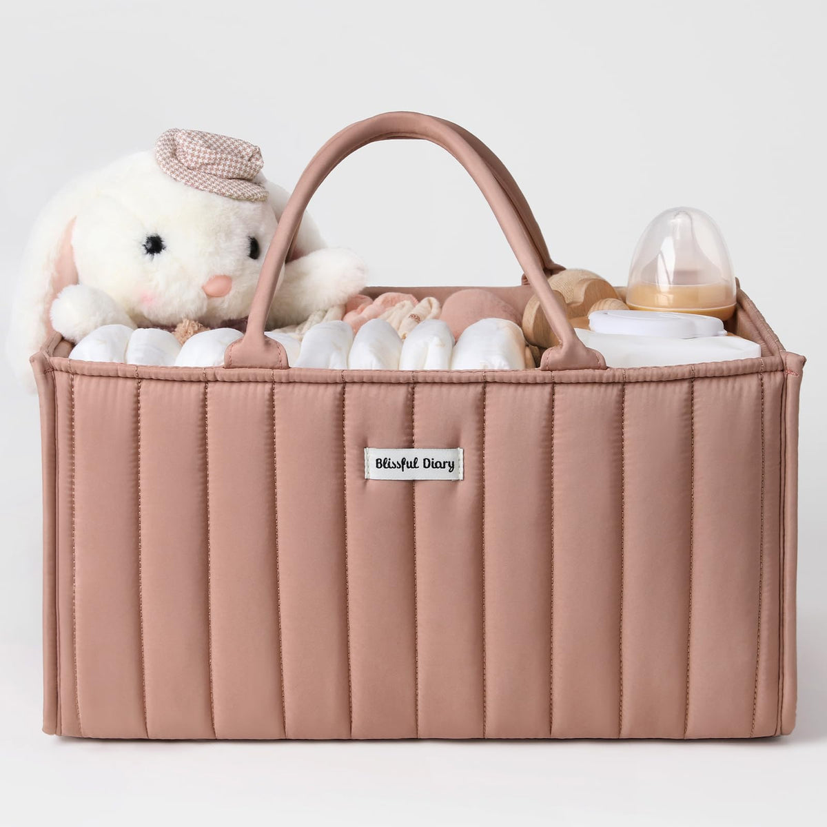 Blissful Diary baby diaper caddy blush pink open layout for quick diaper changes.
