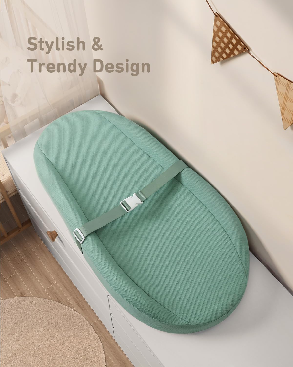 Blissful Diary changing pad security strap adds stability while you reposition baby.