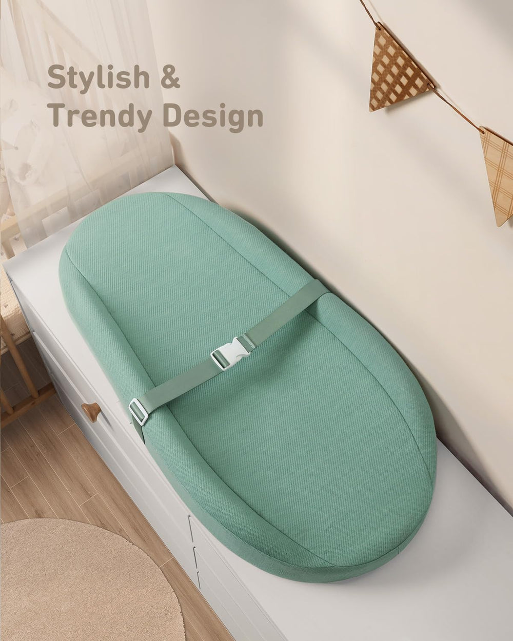 Blissful Diary changing pad security strap adds stability while you reposition baby.
