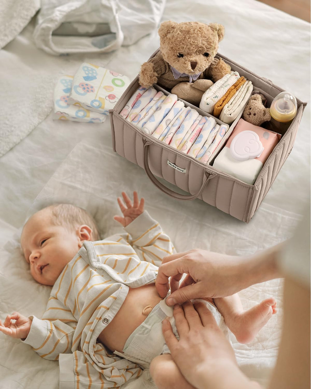 Blissful Diary diaper caddy in bathroom storage setup for baby essentials