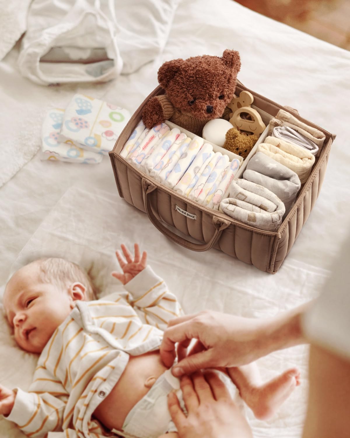 Blissful Diary diaper caddy for nursery and car organization keeps essentials handy.