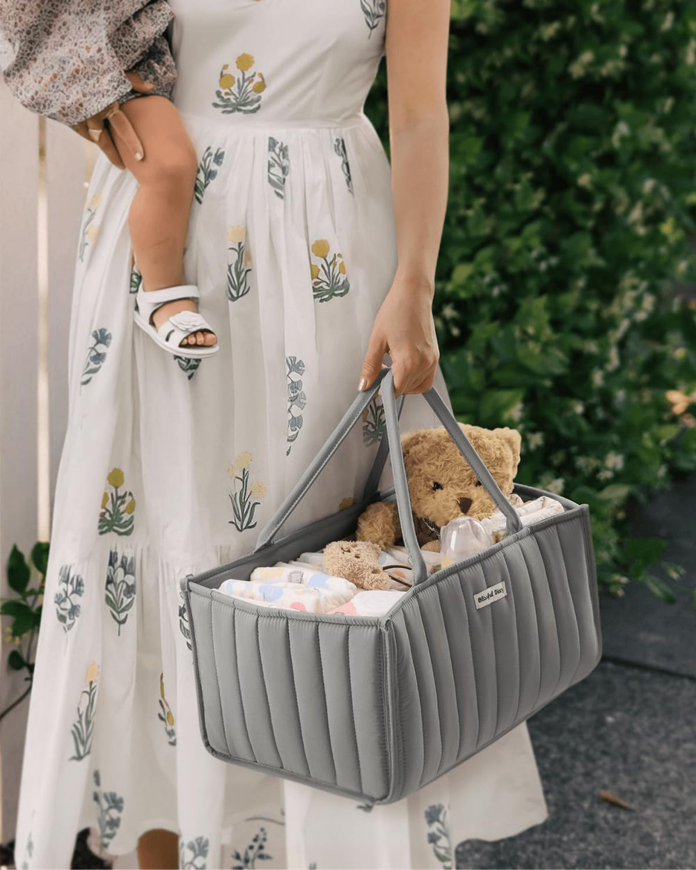 Blissful Diary diaper caddy ready for car trips with essentials organized for on-the-go care.