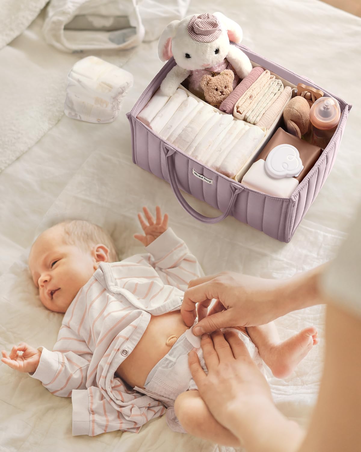 Blissful Diary diaper caddy makes a thoughtful baby shower gift.