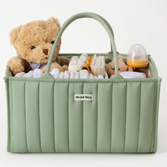 Blissful Diary diaper caddy in sage green keeps newborn essentials within reach for quick changes.