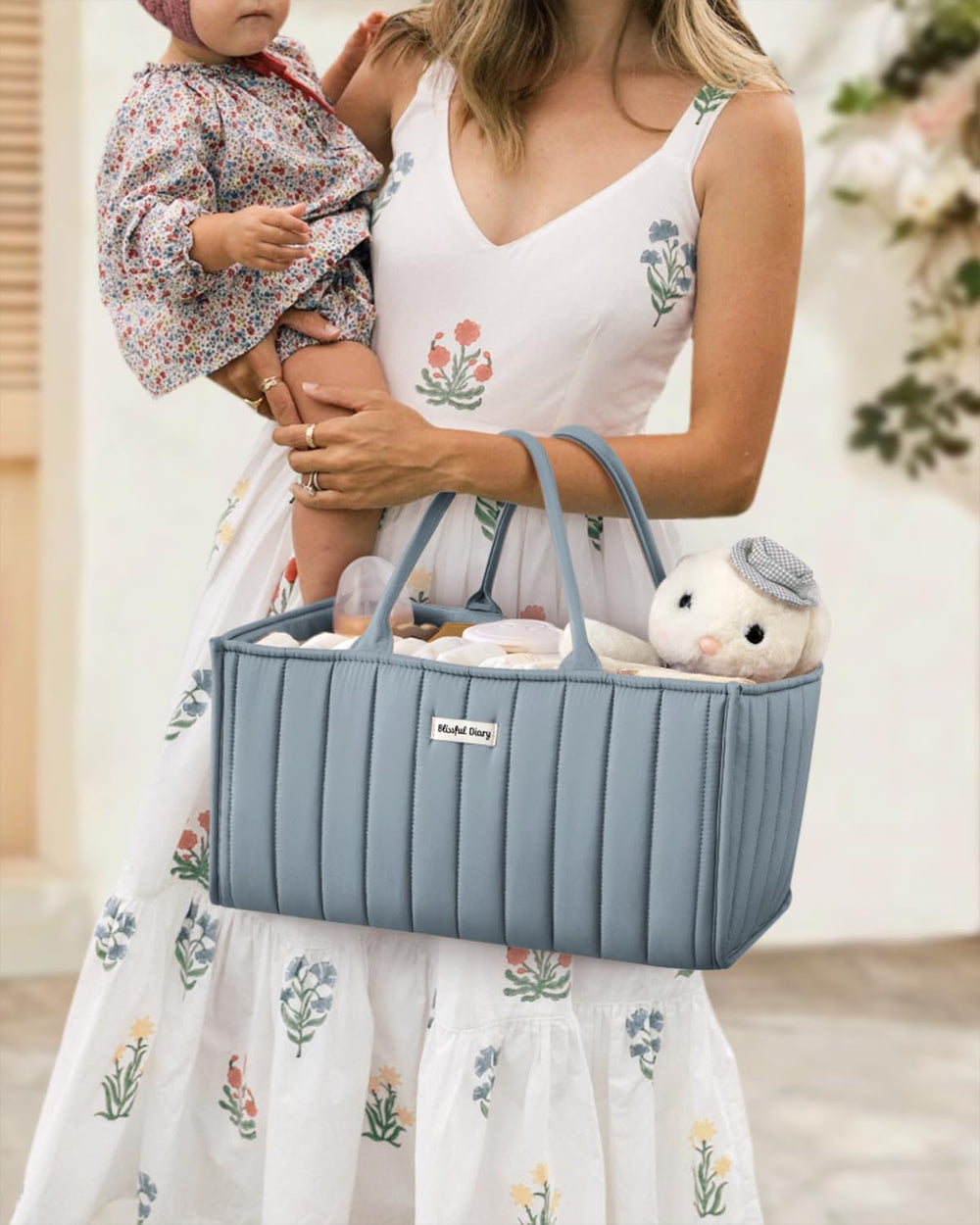 Blissful Diary diaper caddy's stylish dusty blue design complements modern nursery decor.