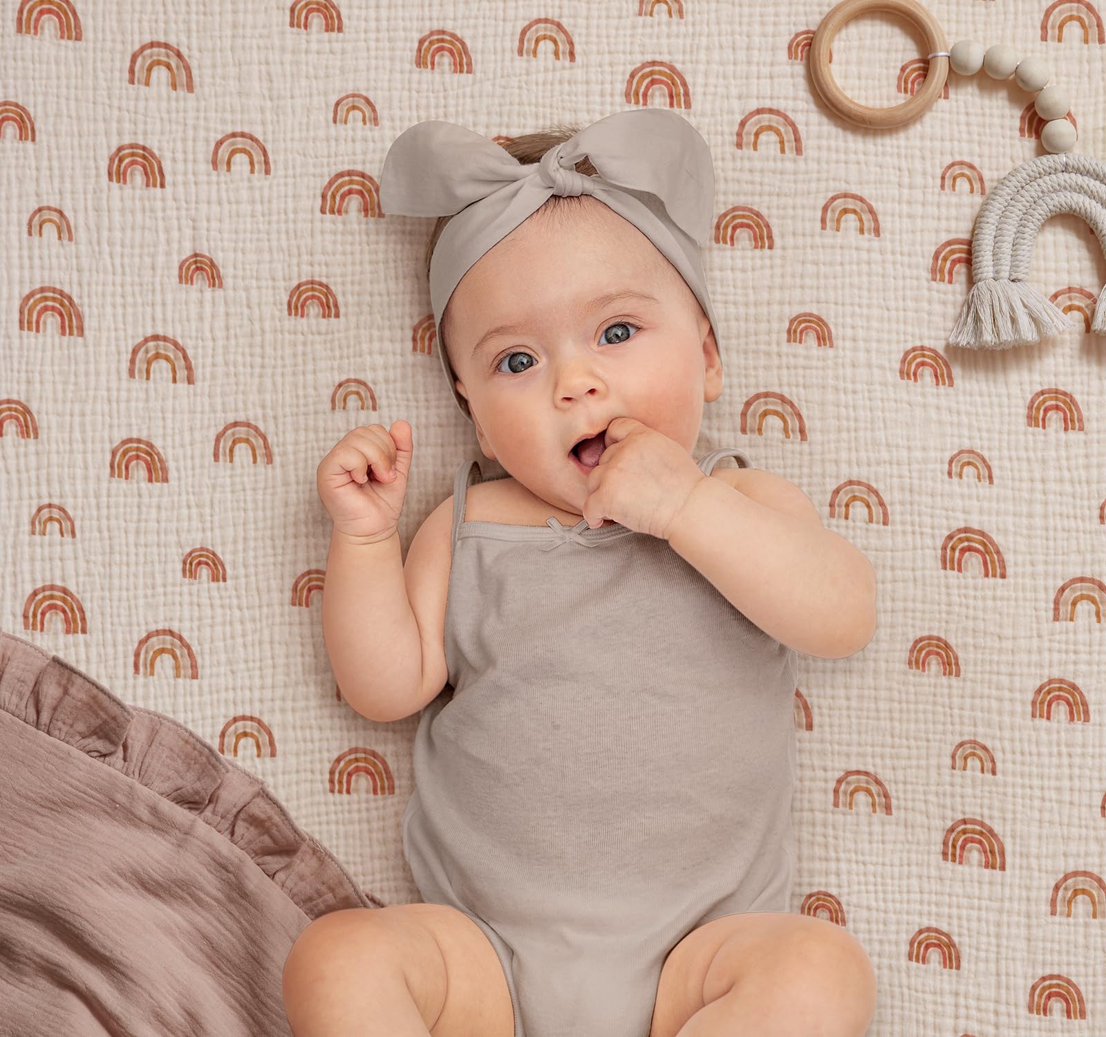 Blissful Diary elastic fit closeup highlights secure pack n play sheet with snug elastic