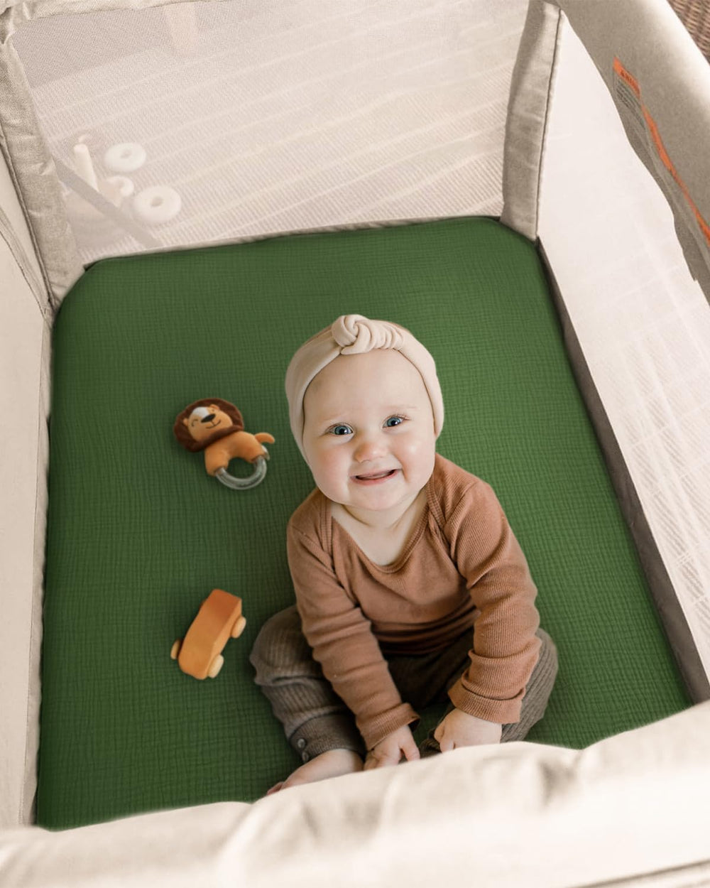 Blissful Diary elastic-fit sheet secures snug pack-n-play mattress fit