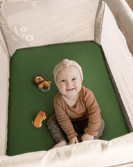 Blissful Diary elastic-fit sheet secures snug pack-n-play mattress fit