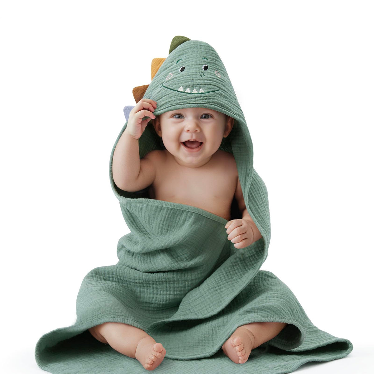 Blissful Diary hooded towel with dino hood close up showing plush muslin for gentle post bath drying