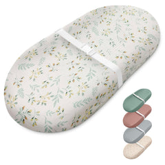 Blissful Diary muslin changing pad botanical leaf cover delivers soft touch and breathable comfort for gentle diaper changes.