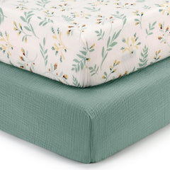 Blissful Diary muslin crib sheets in Roman Green Leaf offer breathable comfort for restful naps.