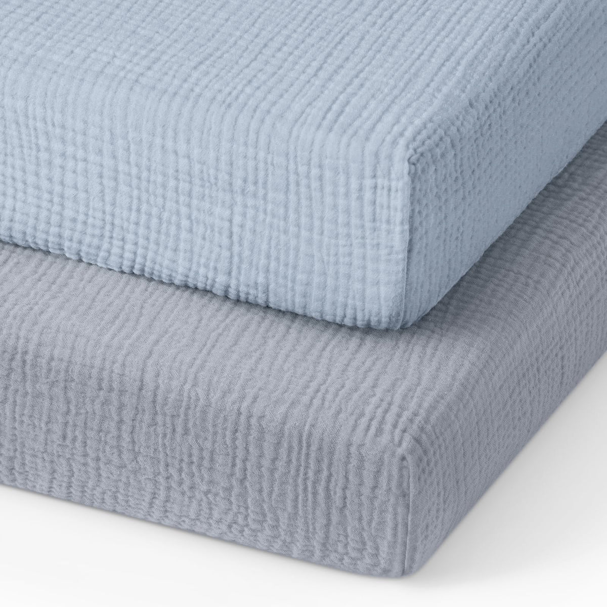 Blissful Diary muslin mini crib sheet in light blue closeup shows breathable, skin-friendly cotton