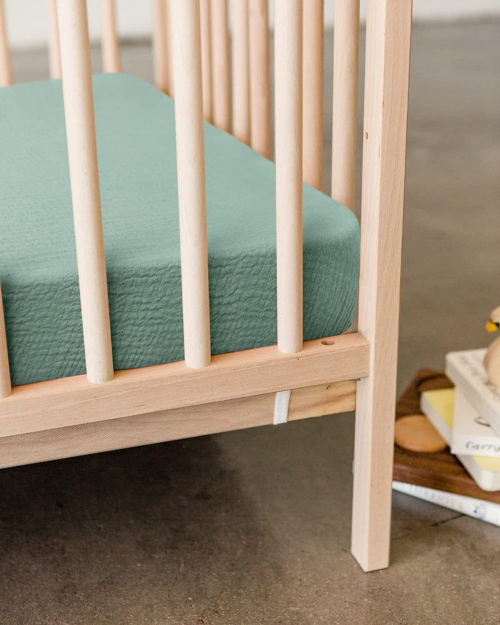 Blissful Diary muslin mini crib sheets shown on a tidy nursery setup