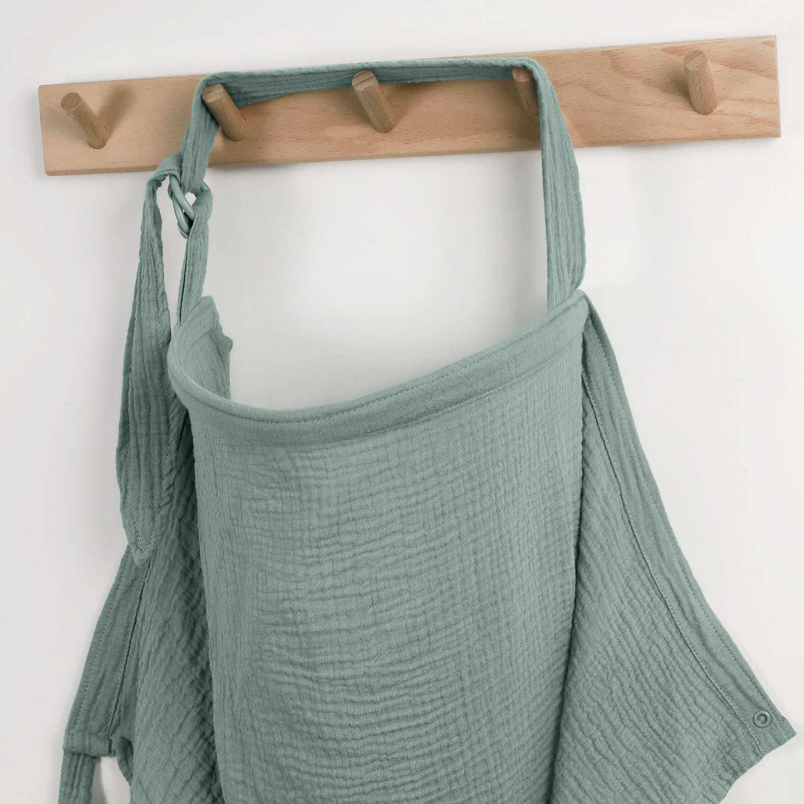 Blissful Diary muslin nursing cover arch neckline improves airflow and baby-eye contact.