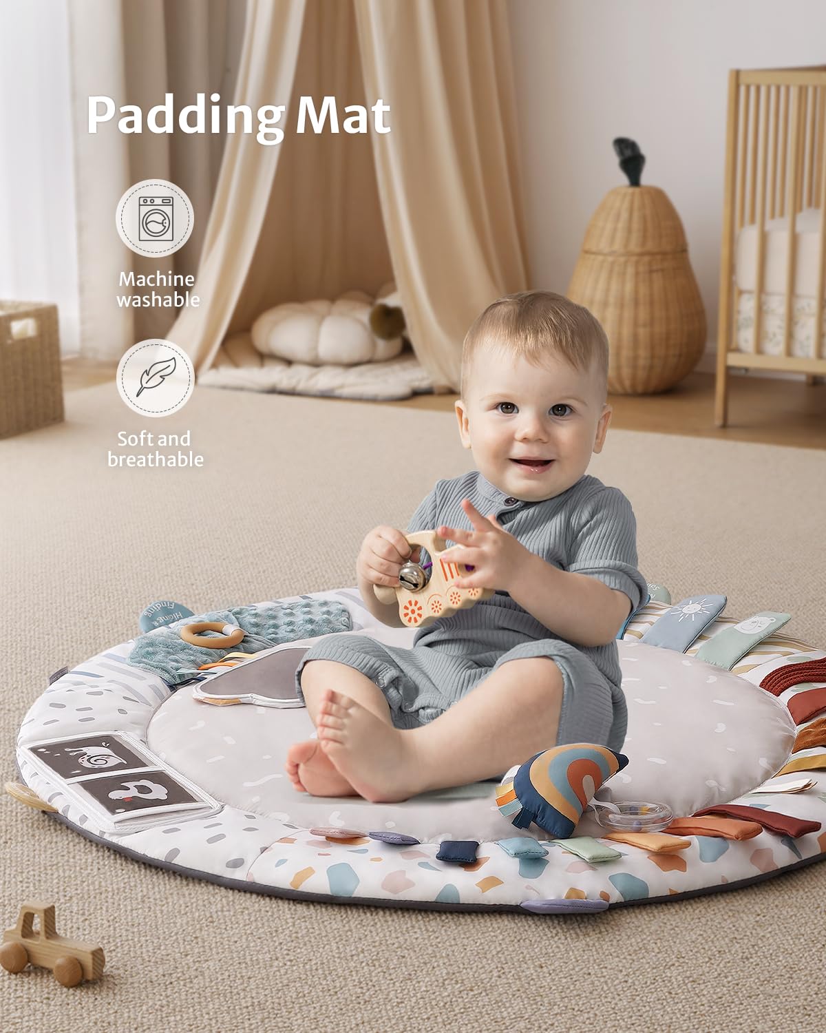 Blissful Diary Play Gym star teether supports teething comfort while reaching and mouthing.