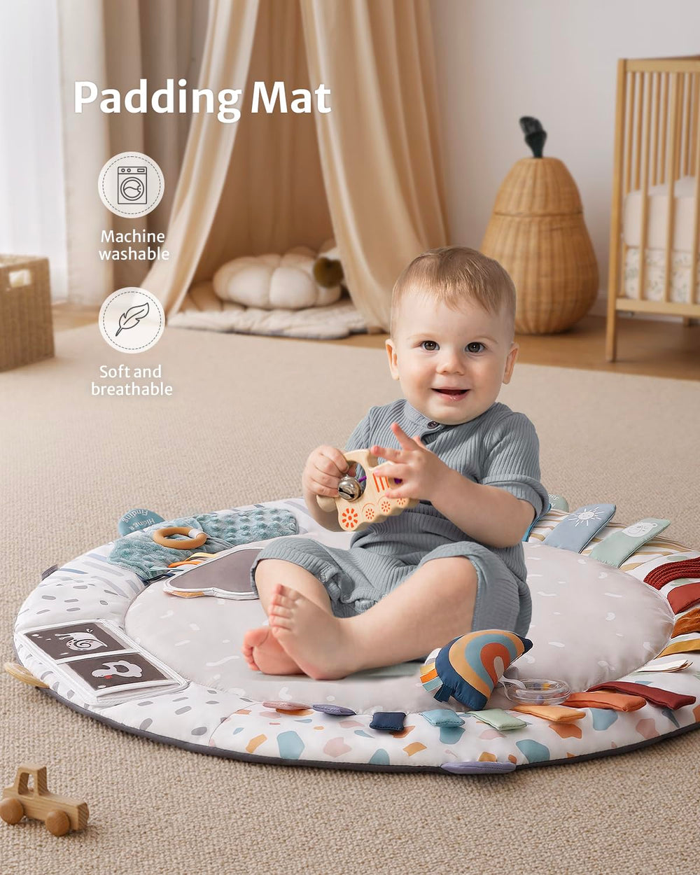 Blissful Diary Play Gym star teether supports teething comfort while reaching and mouthing.