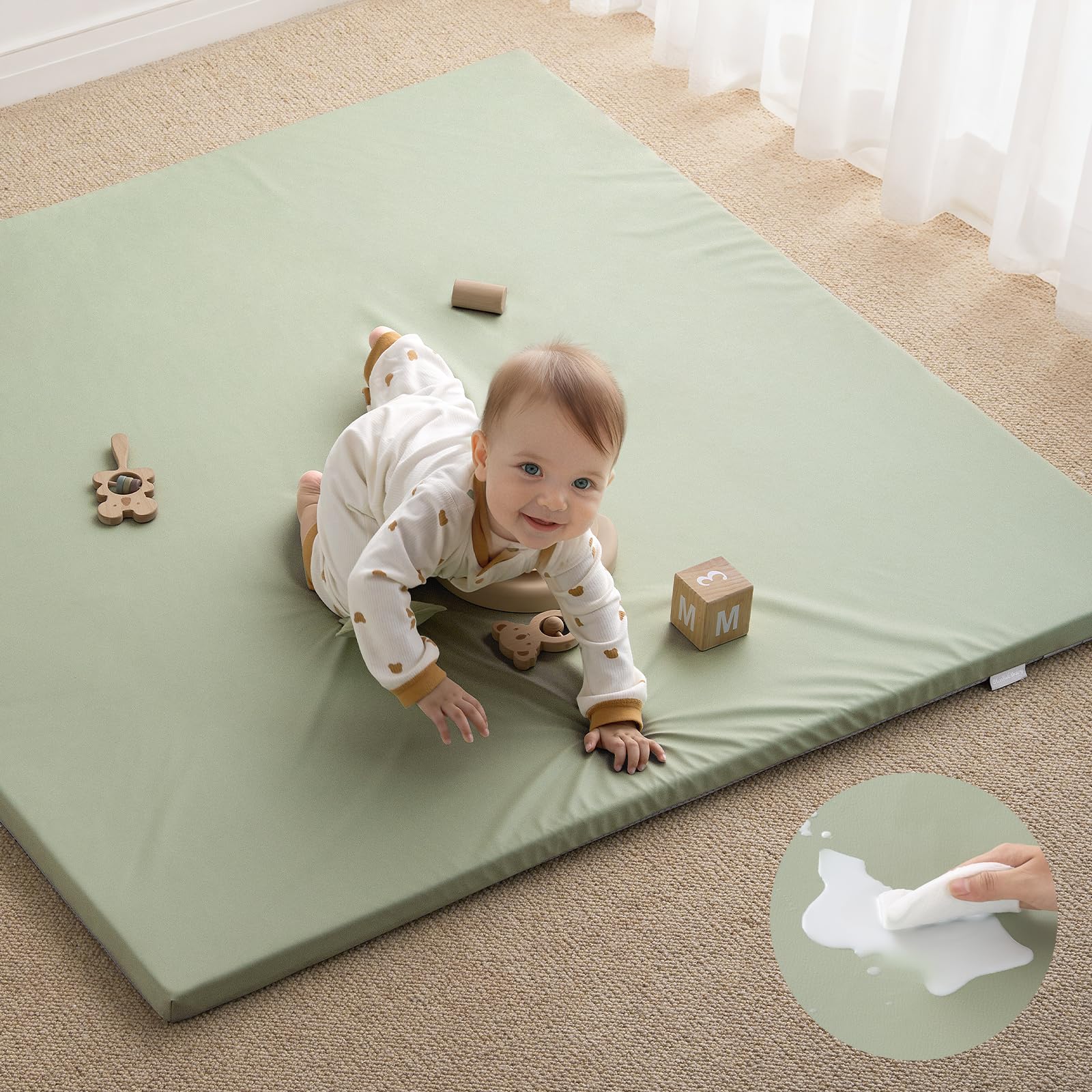Blissful Diary vegan leather play mat with foam cushion for comfy tummy time.