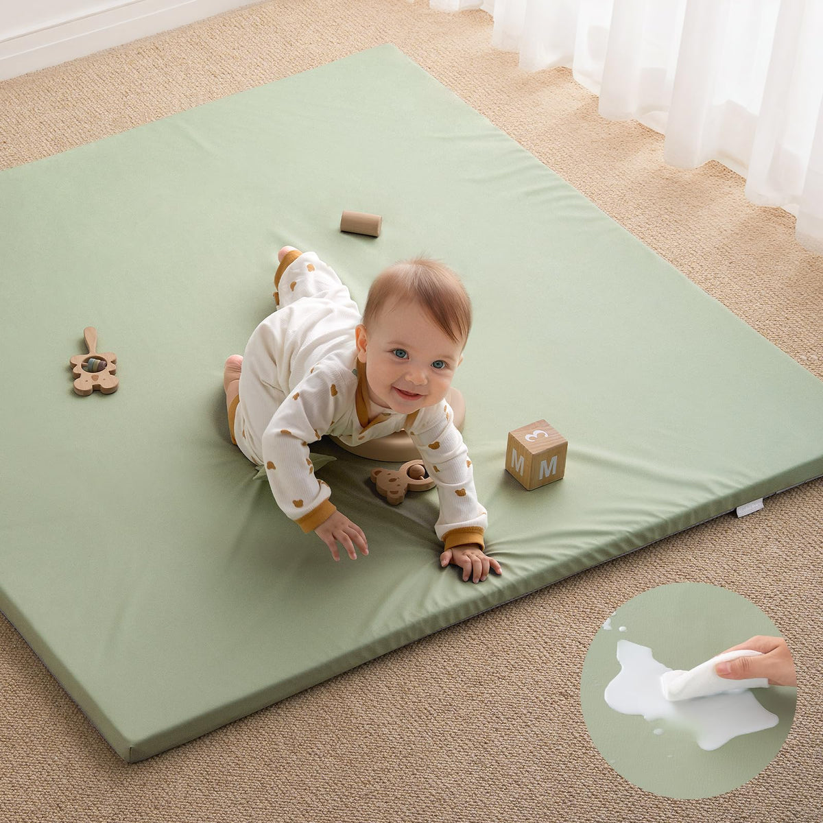 Blissful Diary vegan leather play mat closeup shows cushioned foam for comfortable tummy time.