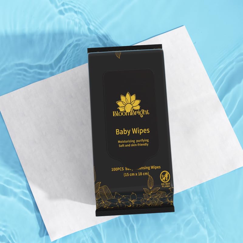 BloomBright Baby Wipes used on face and hands for versatile cleaning tasks.
