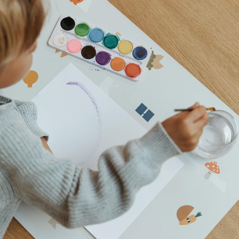 Blooom XL placemat with stain-repellant surface for quick wipe-clean after snacks.