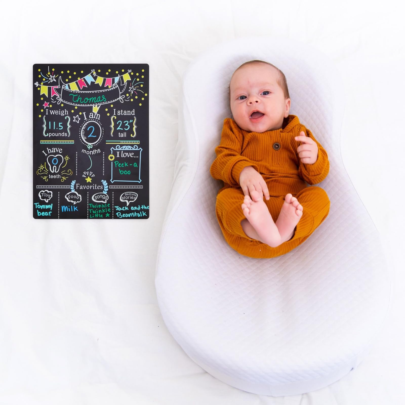Blue Panda milestone chalkboard monthly sign showcases your baby's growth milestones in photos.
