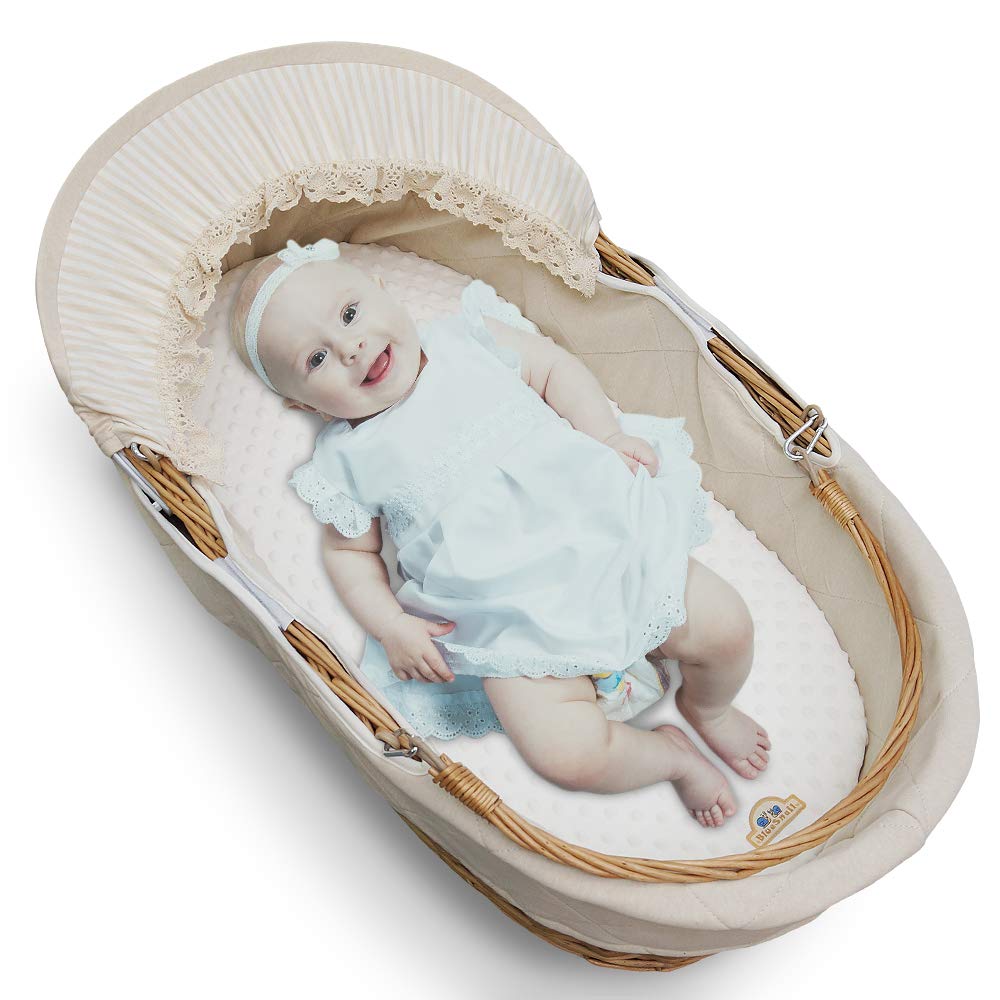 BlueSnail bassinet sheet on a baby sleeping surface highlights durable fabric after washes.