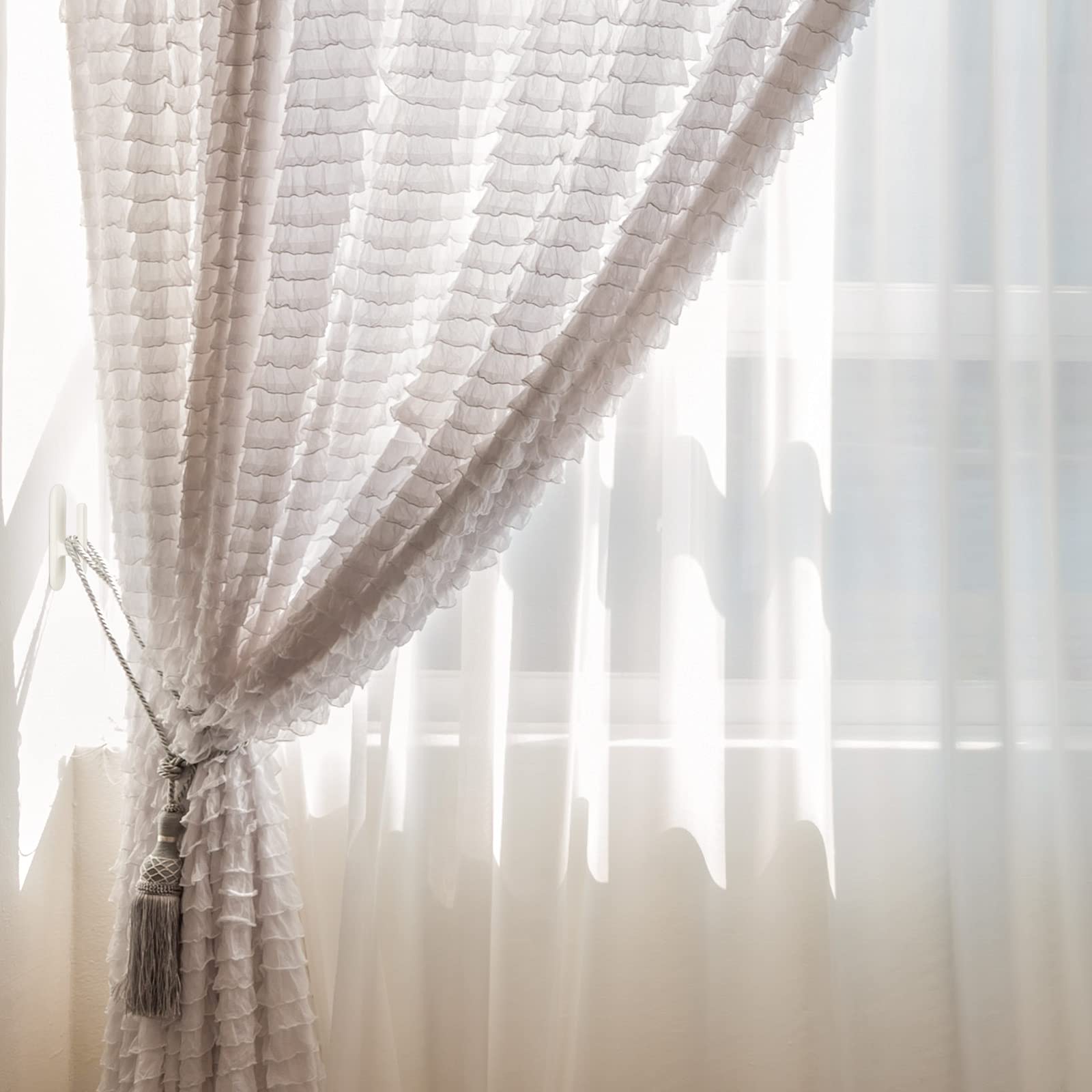 Blulu cord safety blind pull-twister adhesive-back shows easy wall mounting.