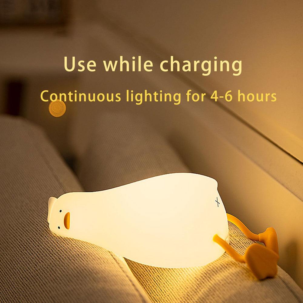 BOATHOG Lying Flat Duck Night Light duck feet hold a phone at a convenient angle.