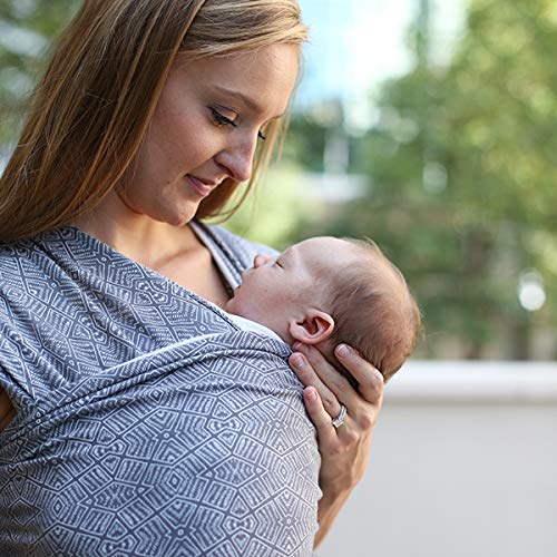 Boba Stretchy Wrap Kahla heartbeat moment shows soothing, secure bonding during baby wearing.