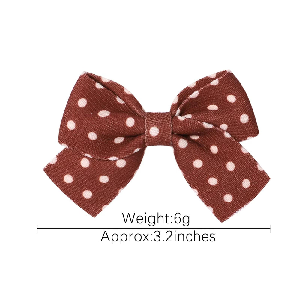 BOENBE LOVED polka-dot alligator clip pair keeps hairstyles in place during play