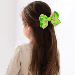 BOENBE LOVED baby bow on headband highlights gift-ready style
