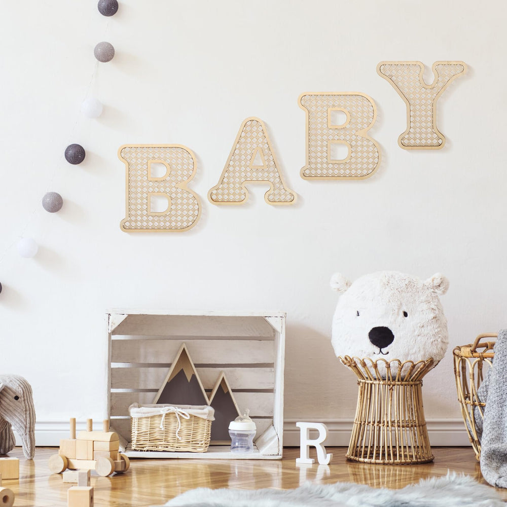 Boho rattan baby letters as newborn gift with rustic charm.