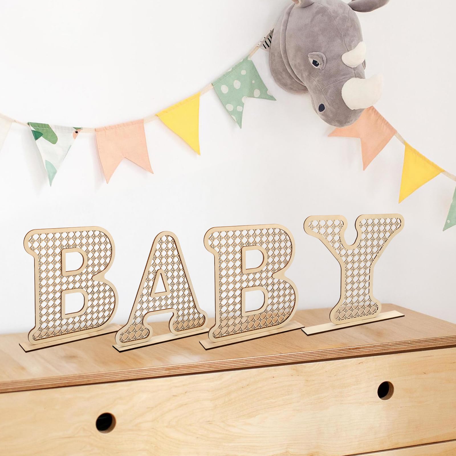 Boho rattan baby letters used in nursery decor for cozy bohemian vibe.