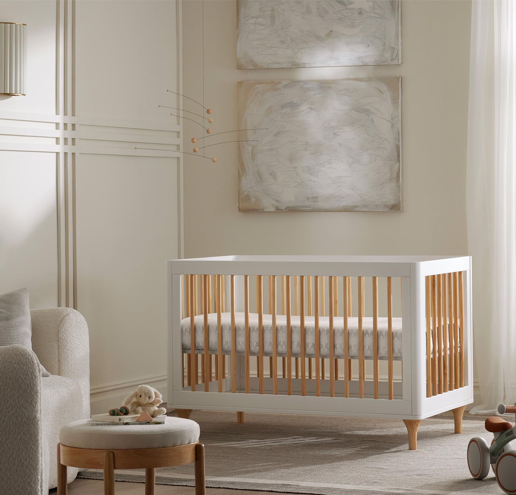Boll & Branch secure-fit sheet with top-stitched elastic for secure crib sleep.