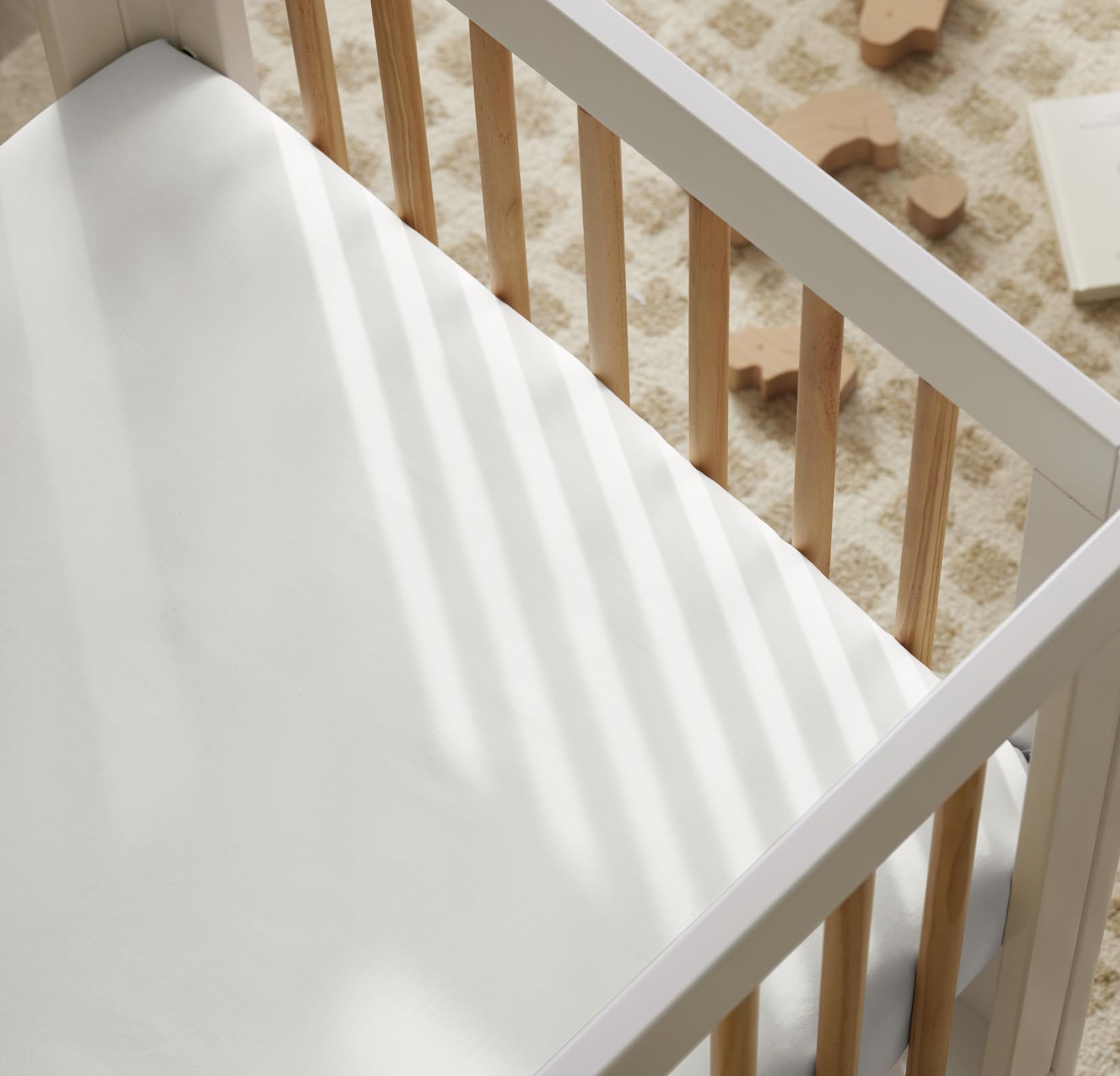 Boll & Branch Signature crib sheet with GOTS-approved dyes ensures safe color and purity.