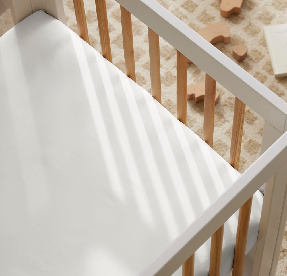 Boll & Branch Signature crib sheet with GOTS-approved dyes ensures safe color and purity.