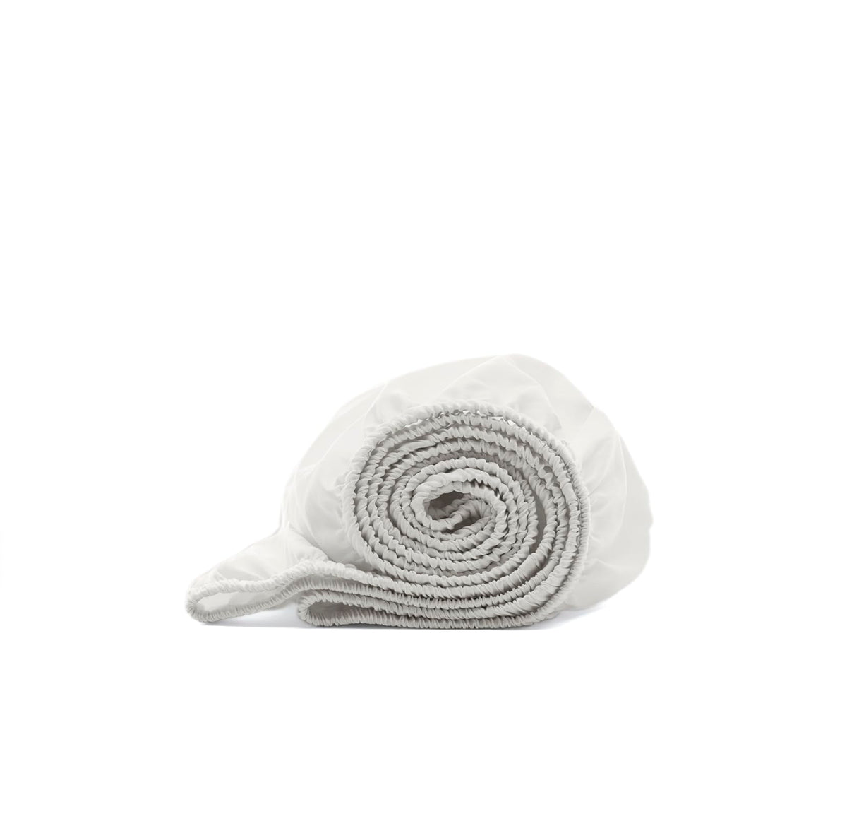 Boll & Branch Signature crib sheet white close-up shows softness for baby sleep.
