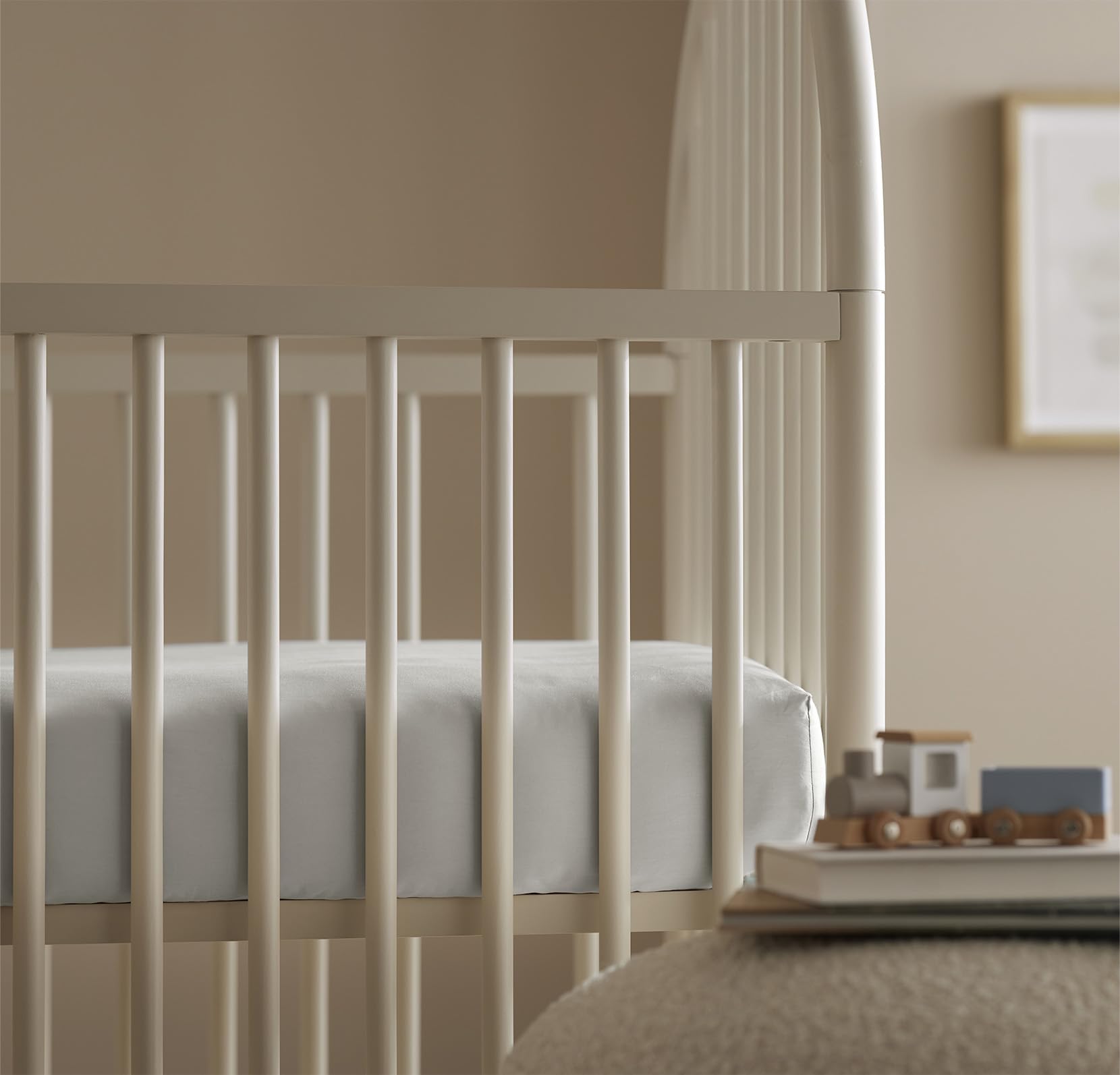 Boll & Branch Mist crib sheet after wash stays soft and durable