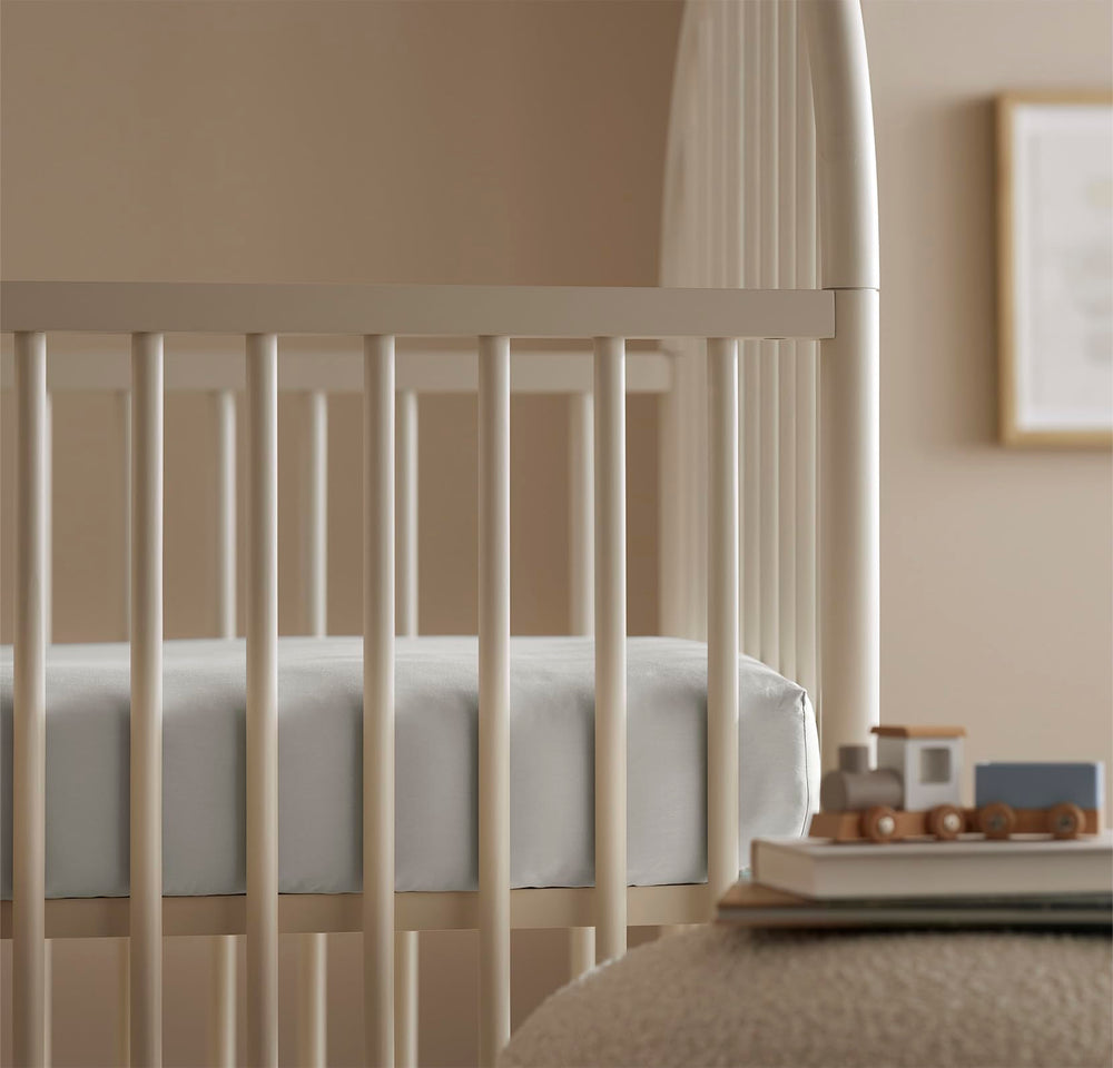 Boll & Branch Mist crib sheet after wash stays soft and durable