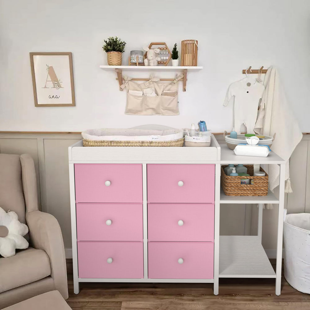 BOLUO dresser in a nursery proves easy assembly and portability.