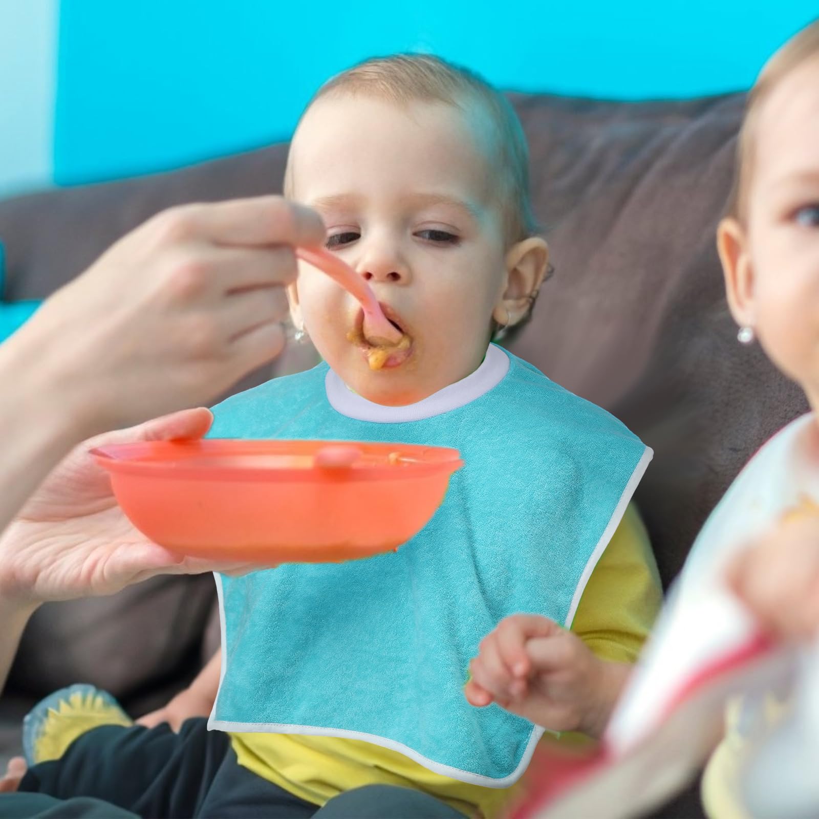 Bonuci bibs in mealtime use close-up for mess-free dining