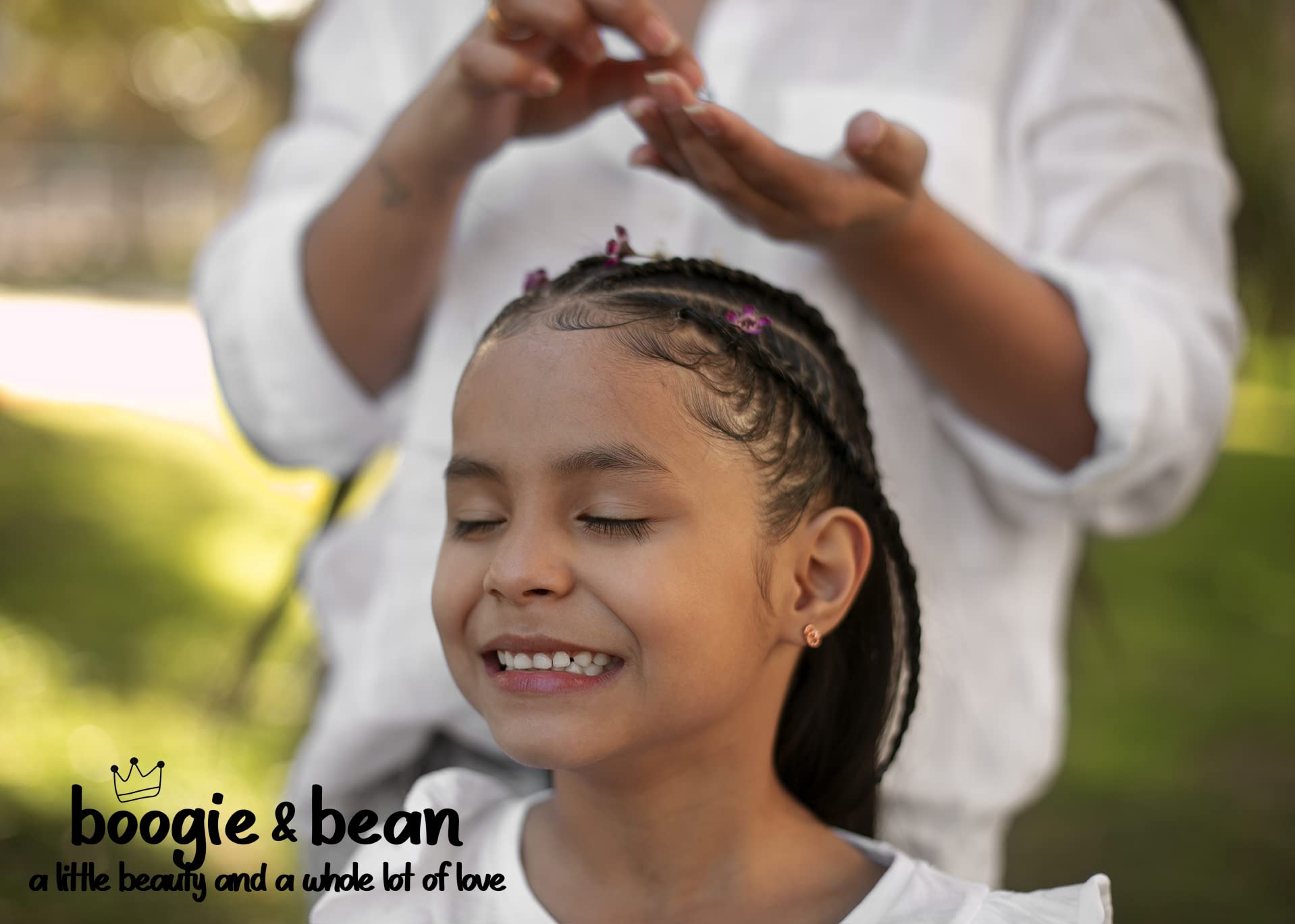 Boogie and Bean coconut oil shown for soothing baby massage.
