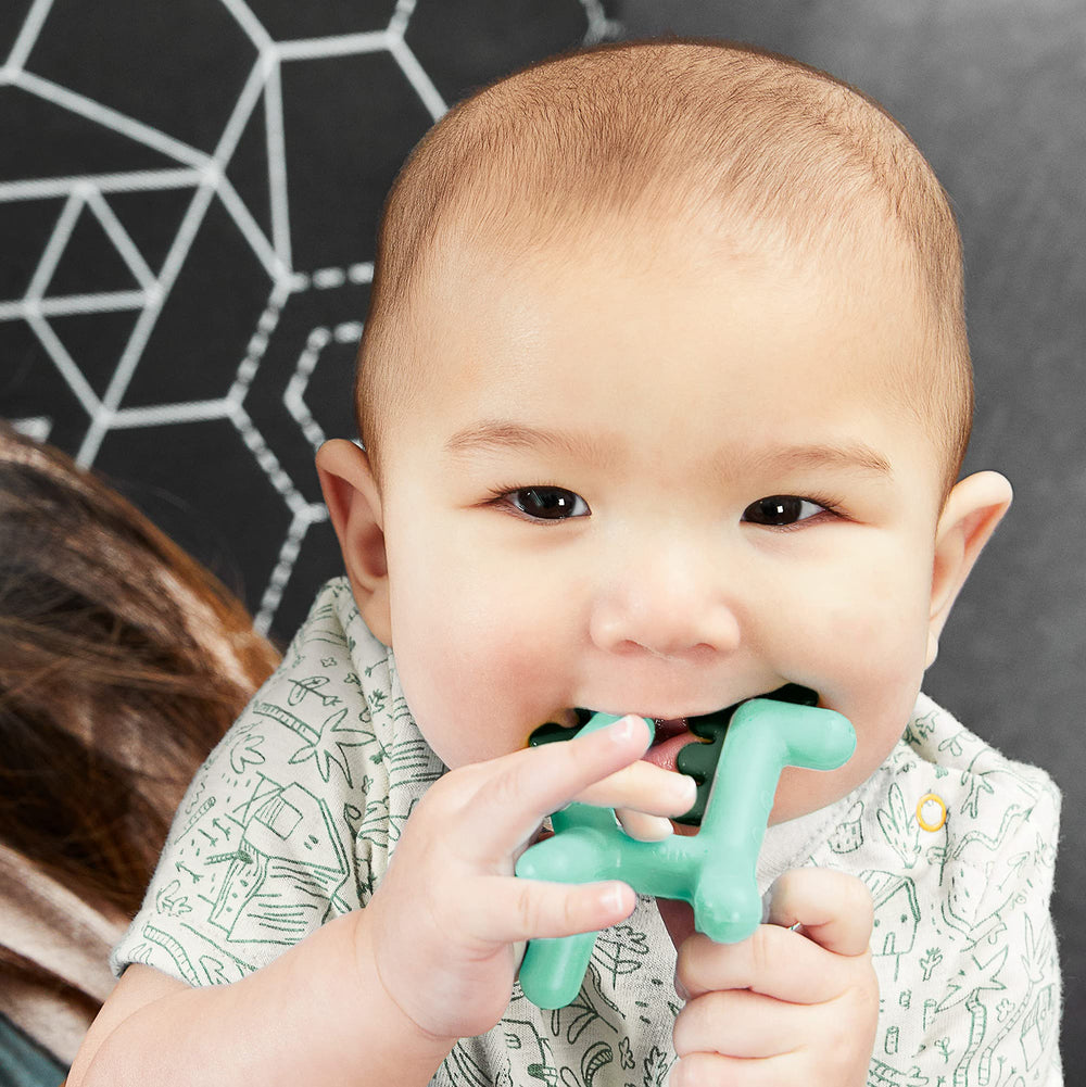 Boon Growl Dragon teether colorful design encourages mouthing and sensory exploration.
