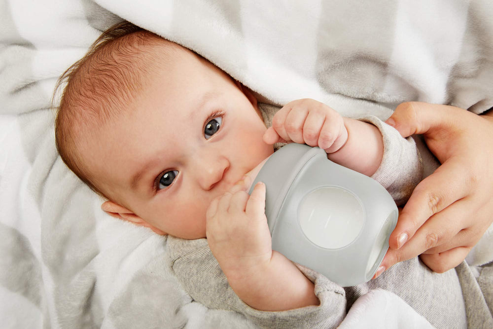Boon Nursh dishwasher-safe gray bottle enables quick cleanup after feeds.