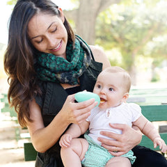 Boon SQUIRT spoon on the go shows portable feeding for travel or outings.