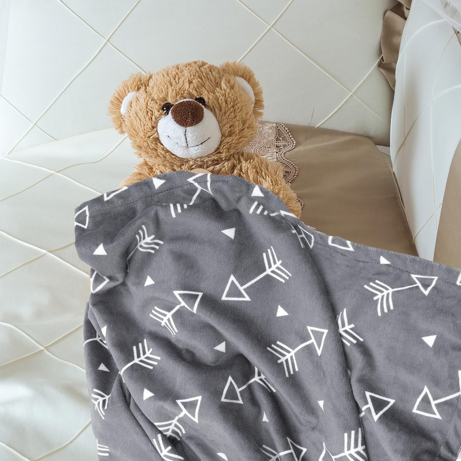 BORITAR blanket used as stroller cover for on-the-go comfort.