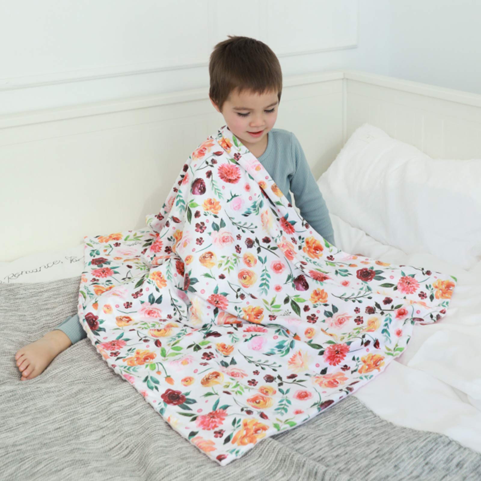 BORITAR blanket used as stroller cover during a sunny walk.