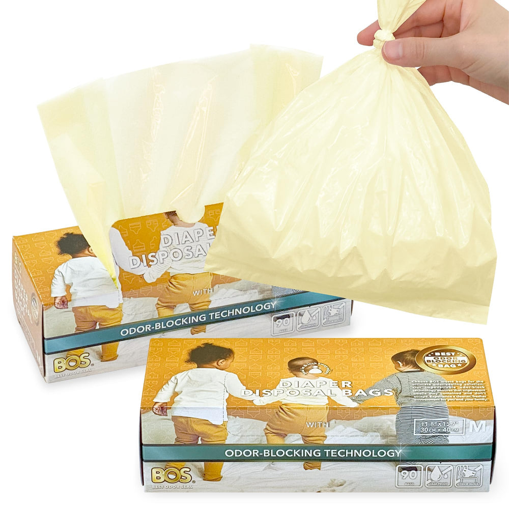 BOS odor-sealing diaper bags in cream yellow lock in odors for a cleaner nursery.